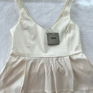 BRAND NEW, never worn ASOS cream peplum top, size US 6